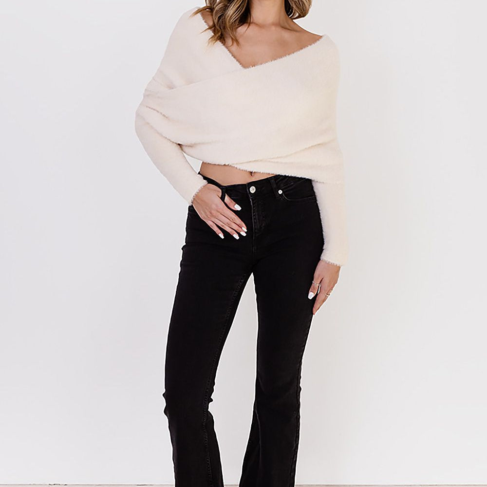 
                      
                        The Etolo Transformative Sweater
                      
                    